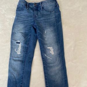 jeans with covered rips